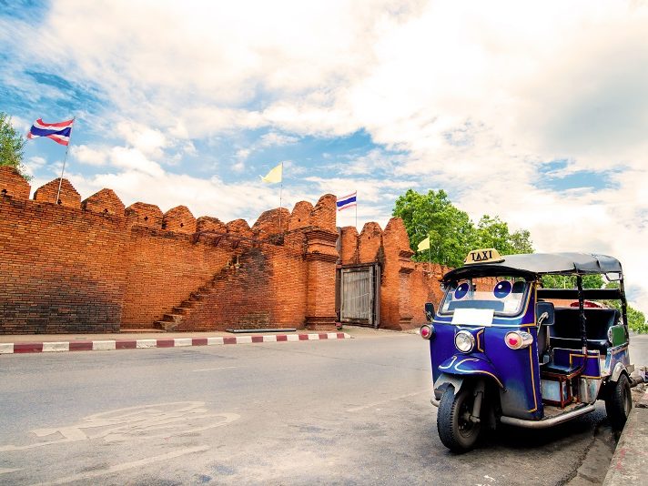 Tuk Tuk with Tha Pae Gate in Chiang Mai